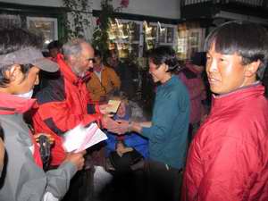 presenting tips to porters